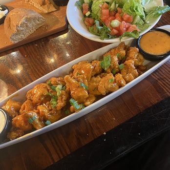 LongHorn Steakhouse - Spicy chicken bites $7.49 and mixed green salad added for only $1.49. - Steakhouses Near Me - Florence, South Carolina LongHorn Steakhouse - Spicy chicken bites $7.49 and mixed green salad added for only $1.49. - Steakhouses Near Me - Florence, South Carolina