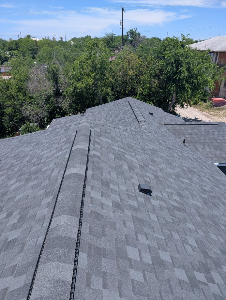 Slide of Green Shield Roofing
