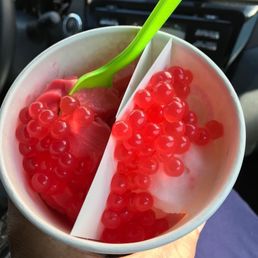 Watermelon and Pink Lemonade Sorbet topped with little juice filled balls. Watermelon and Pink Lemonade Sorbet topped with little juice filled balls.
