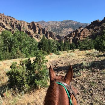 Bill Cody Ranch - the view of the mountains from the back of a horse - Horseback Riding Near Me - Cody, Wyoming Bill Cody Ranch - the view of the mountains from the back of a horse - Horseback Riding Near Me - Cody, Wyoming
