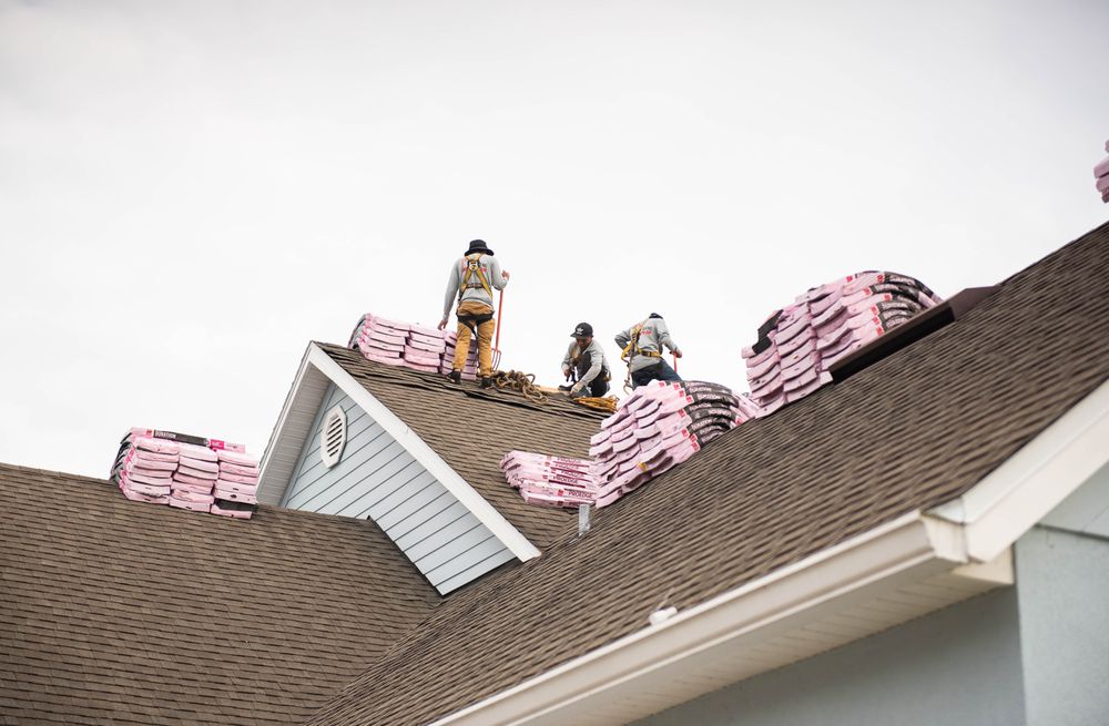 Slide of J Adams Roofing