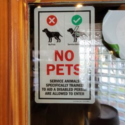 Tequilas Bar & Grill - Refused my ser ice dog inside