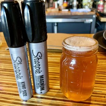 Fetish Brewing - a pint of beer and three markers - Breweries Near Me - Lititz, Pennsylvania