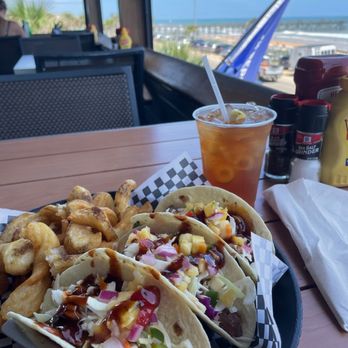 Tortuga's Kitchen & Bar - Pulled pork tacos. - Bars Near Me - Flagler Beach, Florida Tortuga's Kitchen & Bar - Pulled pork tacos. - Bars Near Me - Flagler Beach, Florida