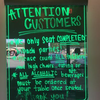 Saki - a neon sign in a store window - Japanese Near Me - Ocean Springs, Mississippi