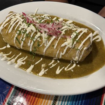 La Travesia - Super burrito with extra steak, cheese, and Mexican rice. Wet with Salsa Verde - Breakfast & Brunch Near Me - San Francisco, California La Travesia - Super burrito with extra steak, cheese, and Mexican rice. Wet with Salsa Verde - Breakfast & Brunch Near Me - San Francisco, California