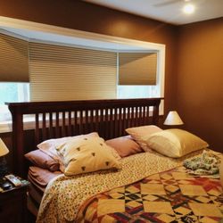 Bay View Shades - We can find shades that fit any type of windows! These are room darkening honeycomb shades.
