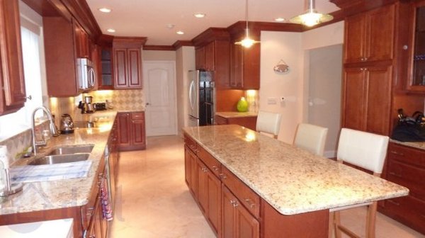 Kitchen Remodel! - Create Your Dream Kitchen, A Remodel That Brings Your Vision to Life
Your kitchen is so much more than just a room, it’s the heart of your home. It’s where you gather with family for breakfast, entertain friends during celebrations, and share moments that become cherished memories. At Royal Contracting, we believe every kitchen should be a true reflection of your lifestyle, personality, and unique aspirations. That’s why our kitchen remodeling services are designed to turn your dreams into reality, one stunning detail at a time.
Modern Kitchen Remodeling for Inspired Living
Ready to reimagine your kitchen? Whether your style is sleek and contemporary, cozy and classic, or bold and innovative, our expert team has the skill, vision, and craftsmanship to deliver the space you’ve always wanted. Our kitchen remodels go beyond surface changes, they completely transform how you experience your home.
Our design process starts with you. We listen closely to your ideas, preferences, and must-haves, collaborating every step of the way to create a customized plan for your perfect kitchen. Want an open-concept layout bathed in natural light? Dreaming of custom cabinets, a show-stopping kitchen island, or top-of-the-line appliances? We’ll help define your goals, and then exceed them.
The Royal Contracting Difference
Personalized Consultation: Every project begins with an in-depth conversation. We explore your vision, talk design inspiration, and help clarify priorities, so you get a kitchen uniquely tailored to your needs.
Expert Kitchen Design: Our seasoned designers are masters at bringing ideas to life with creativity and practicality, guiding you on everything from layout to finishes.
Custom Cabinetry & Storage Solutions: Maximize beauty and function with cabinets built to fit your style and storage needs. Choose from trends like shaker cabinets, glass fronts, soft-close drawers, and more.
Premium Countertops & Surfaces: Elevate your space with quartz, granite, marble, or butcher block—each option offering durability and elegance.
Backsplashes & Statement Walls: Bring the wow factor with eye-catching tile, feature walls, or custom backsplashes that tie the whole room together.
Flooring & Lighting Makeovers: Update worn floors with hardwood, tile, or luxury vinyl, and complete the transformation with layered lighting for ambiance and clarity.
Appliance Upgrades: Integrate energy-efficient, high-performance appliances to make cooking and clean-up a breeze while enhancing your kitchen’s value.
Flawless Craftsmanship: Our professional installers and remodelers take pride in every detail, delivering lasting quality and a mess-free experience.
See the Possibilities, Imagine the Results
Still exploring ideas? Browse our gallery of completed kitchens and be inspired by the amazing transformations we’ve achieved for homeowners right here in Dedham and the surrounding areas. From small kitchen updates to full renovations and luxury remodels, we bring the same care and excellence to every project.
Transitional Kitchen Remodels with a seamless blend of classic and modern.
Luxury Upgrades featuring custom islands, chic lighting, and premium materials.
Functional Family Spaces with open concepts, ample seating, and easy-flow layouts.
Space-Saving Designs ideal for compact kitchens in condos, apartments, and cottages.
Why Homeowners Choose Royal Contracting
Over 20 Years of experience in kitchen remodeling and home renovation.
Locally owned and operated, committed to the Dedham community.
Up-to-date on the latest trends, materials, and smart technology.
Transparent communication and project management from start to finish.
A reputation for integrity, reliability, and exceeding client expectations.
Your Vision. Our Expertise. The Kitchen You’ve Always Wanted.
When you remodel with Royal Contracting, you’re not just renovating a room, you’re elevating your entire home experience. We handle everything: design, permitting, construction, cleanup, and the finishing touches that make your kitchen truly remarkable.
Ready to start your journey? Contact us for a complimentary consultation and see how easy and rewarding a kitchen remodel can be. Share your ideas, ask all your questions, and let us show you what’s possible. Together, we’ll create a space where you’ll love to cook, entertain, and live.
Royal Contracting, Turning Kitchen Dreams into Lasting Reality Kitchen Remodel! - Create Your Dream Kitchen, A Remodel That Brings Your Vision to Life
Your kitchen is so much more than just a room, it’s the heart of your home. It’s where you gather with family for breakfast, entertain friends during celebrations, and share moments that become cherished memories. At Royal Contracting, we believe every kitchen should be a true reflection of your lifestyle, personality, and unique aspirations. That’s why our kitchen remodeling services are designed to turn your dreams into reality, one stunning detail at a time.
Modern Kitchen Remodeling for Inspired Living
Ready to reimagine your kitchen? Whether your style is sleek and contemporary, cozy and classic, or bold and innovative, our expert team has the skill, vision, and craftsmanship to deliver the space you’ve always wanted. Our kitchen remodels go beyond surface changes, they completely transform how you experience your home.
Our design process starts with you. We listen closely to your ideas, preferences, and must-haves, collaborating every step of the way to create a customized plan for your perfect kitchen. Want an open-concept layout bathed in natural light? Dreaming of custom cabinets, a show-stopping kitchen island, or top-of-the-line appliances? We’ll help define your goals, and then exceed them.
The Royal Contracting Difference
Personalized Consultation: Every project begins with an in-depth conversation. We explore your vision, talk design inspiration, and help clarify priorities, so you get a kitchen uniquely tailored to your needs.
Expert Kitchen Design: Our seasoned designers are masters at bringing ideas to life with creativity and practicality, guiding you on everything from layout to finishes.
Custom Cabinetry & Storage Solutions: Maximize beauty and function with cabinets built to fit your style and storage needs. Choose from trends like shaker cabinets, glass fronts, soft-close drawers, and more.
Premium Countertops & Surfaces: Elevate your space with quartz, granite, marble, or butcher block—each option offering durability and elegance.
Backsplashes & Statement Walls: Bring the wow factor with eye-catching tile, feature walls, or custom backsplashes that tie the whole room together.
Flooring & Lighting Makeovers: Update worn floors with hardwood, tile, or luxury vinyl, and complete the transformation with layered lighting for ambiance and clarity.
Appliance Upgrades: Integrate energy-efficient, high-performance appliances to make cooking and clean-up a breeze while enhancing your kitchen’s value.
Flawless Craftsmanship: Our professional installers and remodelers take pride in every detail, delivering lasting quality and a mess-free experience.
See the Possibilities, Imagine the Results
Still exploring ideas? Browse our gallery of completed kitchens and be inspired by the amazing transformations we’ve achieved for homeowners right here in Dedham and the surrounding areas. From small kitchen updates to full renovations and luxury remodels, we bring the same care and excellence to every project.
Transitional Kitchen Remodels with a seamless blend of classic and modern.
Luxury Upgrades featuring custom islands, chic lighting, and premium materials.
Functional Family Spaces with open concepts, ample seating, and easy-flow layouts.
Space-Saving Designs ideal for compact kitchens in condos, apartments, and cottages.
Why Homeowners Choose Royal Contracting
Over 20 Years of experience in kitchen remodeling and home renovation.
Locally owned and operated, committed to the Dedham community.
Up-to-date on the latest trends, materials, and smart technology.
Transparent communication and project management from start to finish.
A reputation for integrity, reliability, and exceeding client expectations.
Your Vision. Our Expertise. The Kitchen You’ve Always Wanted.
When you remodel with Royal Contracting, you’re not just renovating a room, you’re elevating your entire home experience. We handle everything: design, permitting, construction, cleanup, and the finishing touches that make your kitchen truly remarkable.
Ready to start your journey? Contact us for a complimentary consultation and see how easy and rewarding a kitchen remodel can be. Share your ideas, ask all your questions, and let us show you what’s possible. Together, we’ll create a space where you’ll love to cook, entertain, and live.
Royal Contracting, Turning Kitchen Dreams into Lasting Reality