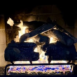 Fireplace Gallery - Fireplace log set after service work was completed.