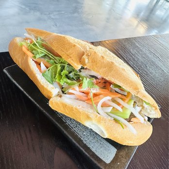 Arome Cafe - The fresh veggies are hiding all the grilled pork inside this bahn mi. Take a look at my cross-section photo! - Coffee & Tea Near Me - San Jose, California