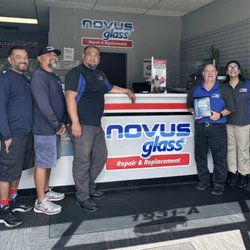 NOVUS Glass of Concord - Our staff in our office/waiting room, with our award for being the best of 2026