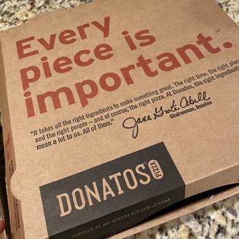 Donatos Pizza - a box of pizza on a counter - Pizza Near Me - Murfreesboro, Tennessee