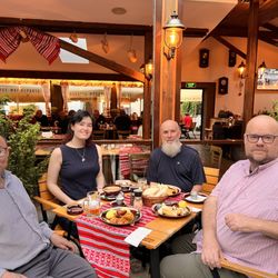Qigong Certification & Daoist Training Center - 2025 Daoism conference in Romania, having dinner with Daoist scholars.