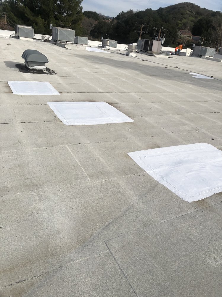 Slide of Mencho's Roofing & Repairs