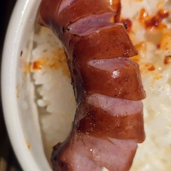 Yakiniku Like - Kurobuta sausage cooked. It comes with slits in them. - Japanese Near Me - Honolulu, Hawaii Yakiniku Like - Kurobuta sausage cooked. It comes with slits in them. - Japanese Near Me - Honolulu, Hawaii