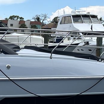 Dockside Waterfront Grill - Some sweet rides, parked out back. July 2025 - Seafood Near Me - Venice, Florida