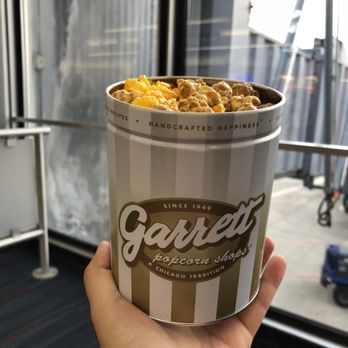 Garrett Popcorn Shops - Petite tin of garret mix - perfect to snack on at the gate! - Popcorn Shops Near Me - Chicago, Illinois Garrett Popcorn Shops - Petite tin of garret mix - perfect to snack on at the gate! - Popcorn Shops Near Me - Chicago, Illinois