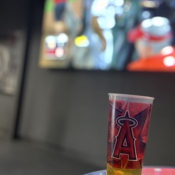 Coors Light Center Field Bar - a glass of beer on a table - Stadiums & Arenas Near Me - Anaheim, California Coors Light Center Field Bar - a glass of beer on a table - Stadiums & Arenas Near Me - Anaheim, California