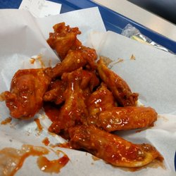 Wingman - XXX-Hot wings, nice and crispy on the outside, and swimming in sauce at the bottom.