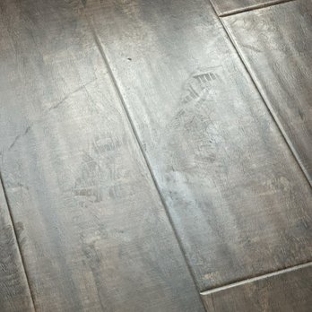 Heaven's Best Long Beach CA - Dried pooling with technician's foot print on laminate floor. - Carpet Cleaning Near Me Heaven's Best Long Beach CA - Dried pooling with technician's foot print on laminate floor. - Carpet Cleaning Near Me