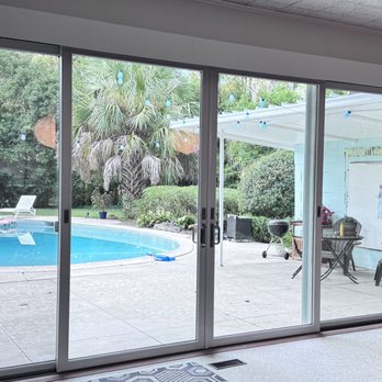Windows & Doors Store - Andersen 4 panel Narrowline Gliding patio door with HIgh Definition Smart sun Glass - Windows Installation Near Me - Newberry , Florida Windows & Doors Store - Andersen 4 panel Narrowline Gliding patio door with HIgh Definition Smart sun Glass - Windows Installation Near Me - Newberry , Florida