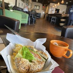 O’Shea’s Caife & Tae - Chicken salad on everything bagel, hot tea latte