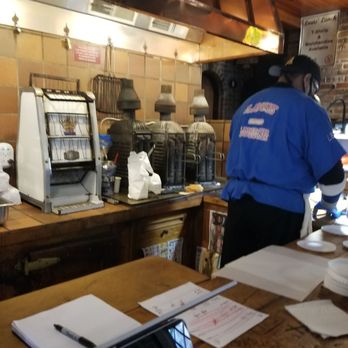 Louis' Lunch - Order counter and the original fire grills - Burgers Near Me - New Haven, Connecticut Louis' Lunch - Order counter and the original fire grills - Burgers Near Me - New Haven, Connecticut