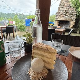 Coconut Cake with ice cream. The complete experience with this dessert. Their speciality Coconut Cake with ice cream. The complete experience with this dessert. Their speciality