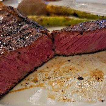 Gibsons Italia - NY Strip Steak served medium-rare - Steakhouses Near Me - Chicago, Illinois