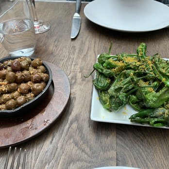 NOMO Kitchen - Olives and shishito peppers - New American Near Me - New York, New York