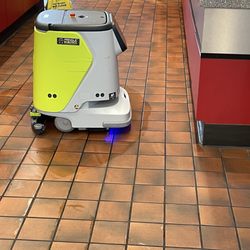 QuikTrip - Floor cleaning talking robot