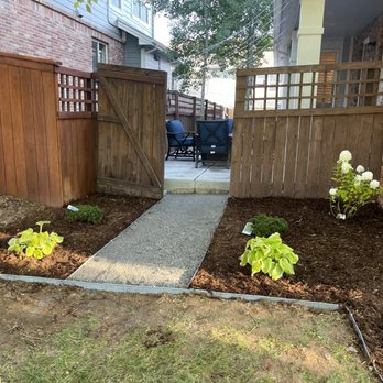 Bright Sun Landscaping - a small garden in front of a house - Landscaping Near Me Bright Sun Landscaping - a small garden in front of a house - Landscaping Near Me
