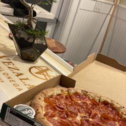 Papa Johns Pizza - Steaming hot pizza