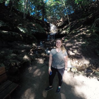 Horseshoe Falls & Gift Shop - Wide-angle lens, but 5'4" me is obviously not overpowered by the fall. - Tours Near Me - Munising, Michigan