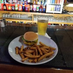 Neighbors House Bar And Grill - The Tuesday special comes with a beer!