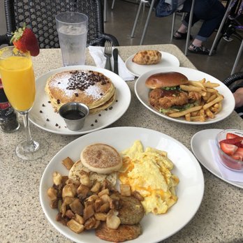 Black Walnut Café - Chocolate chip Pancakes, The American Breakfast, Korean fried Chicken Sandwich & a Mimosa. - Cafes Near Me - Katy, Texas