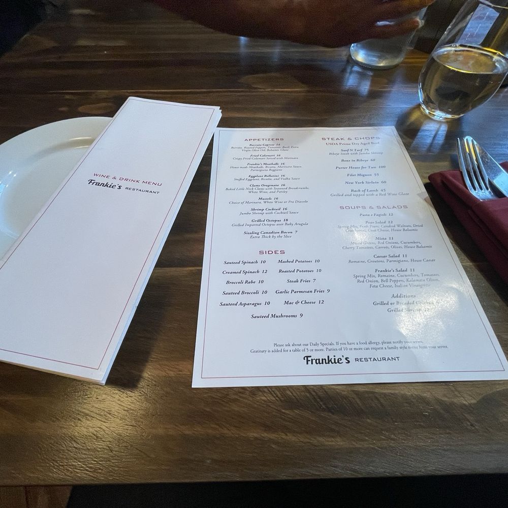Frankie's Restaurant - a menu on a wooden table - Italian Near Me - Bronx, New York Frankie's Restaurant - a menu on a wooden table - Italian Near Me - Bronx, New York