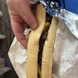 Looks NOTHING like the Owners Pictures.. Where's the Cheese?? It was melted on the inside the back of the soft/ dry roll.. FML Looks NOTHING like the Owners Pictures.. Where's the Cheese?? It was melted on the inside the back of the soft/ dry roll.. FML