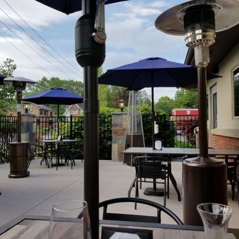 Athos - Note how far apart the tables outside are placed - Greek Near Me - Albany, New York