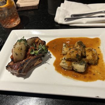 The Blackberry Brasserie - Ozark Bone-in Pork Chop - Cocktail Bars Near Me - Rogers, Arkansas