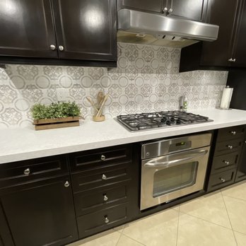 Millenium Tile & Marble - Finished quartz counter with tile backsplash - General Contractors Near Me - Anaheim, California