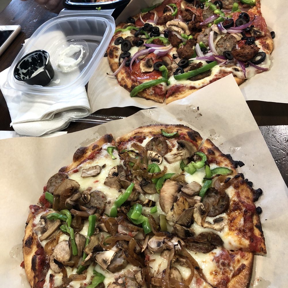 Build your own & Topp'd pizza. Build your own & Topp'd pizza.