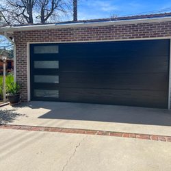 Neighborly Garage Door Pros - Black flash texture side windows garage door.