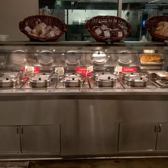 Central Market - This is the soup bar. My shots of the salad bar were pretty bad. They have small 2 Oz cups for tasting.Good chili! - Grocery Near Me - Plano, Texas