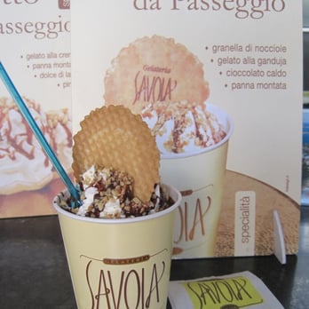 Gelateria Savoia - Gianduiotto-- chocolate ice cream and whole nuts, topped with whipped cream, hot chocolate sauce, and a cookie wafer - Ice Cream & Frozen Yogurt Near Me - Verona, VR