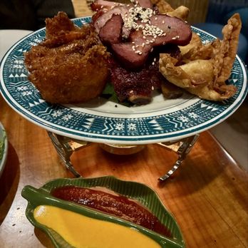 Trader Vic's - Pupu plate "Cosmo Tidbits"- shrimp, pork, ribs, crab Rangoon ($33) - Hawaiian Near Me - Emeryville, California