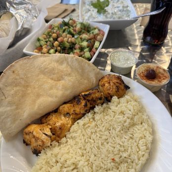 Sirks - Cucumber salad, protein salad and chicken , rice and pita bread. - Middle Eastern Near Me - Glendale, Arizona