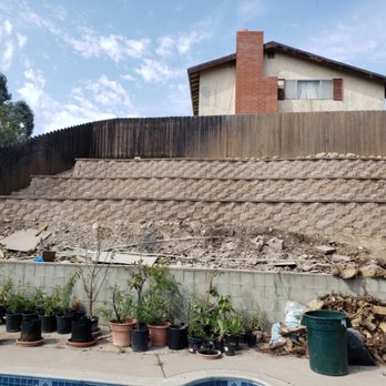 Landscape and Transport - 3 tears retaining walls - Landscaping Near Me