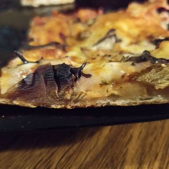 Qualia Pizzaria - And one more picture of the thin crust in comparison to the size of the slice. - Pizza Near Me - St. Catharines, Ontario Qualia Pizzaria - And one more picture of the thin crust in comparison to the size of the slice. - Pizza Near Me - St. Catharines, Ontario