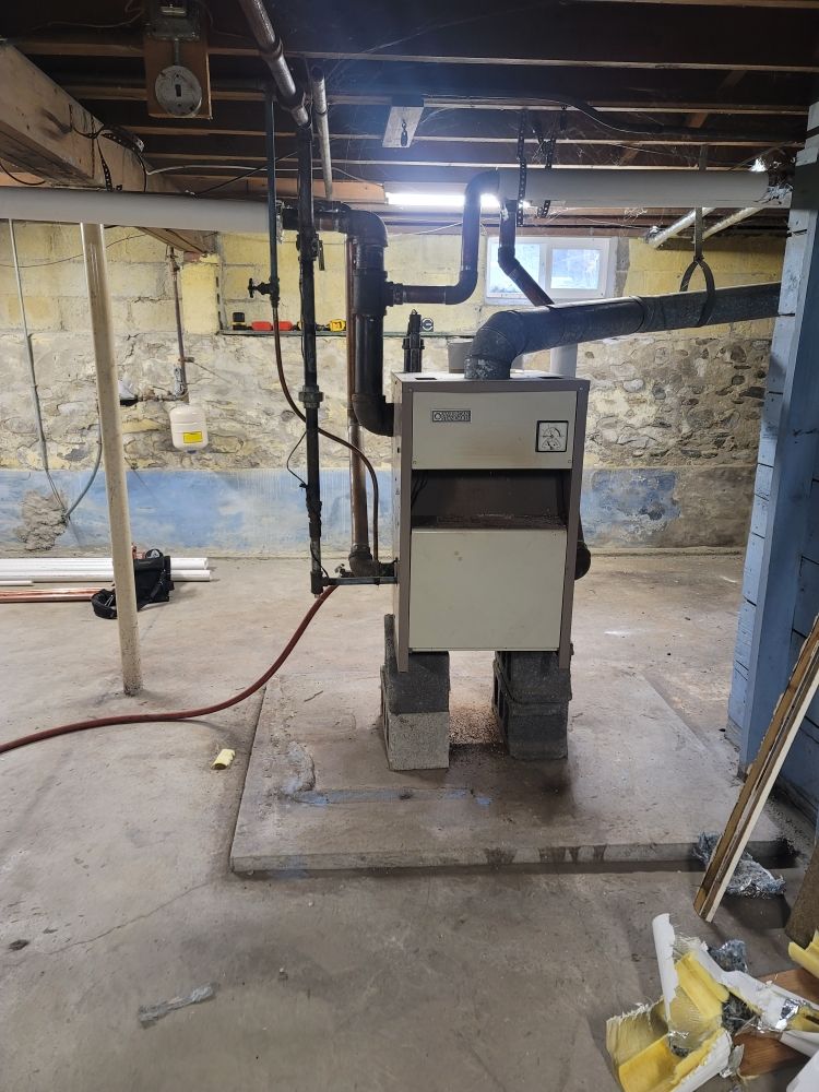 Slide of T&E Plumbing and Heating